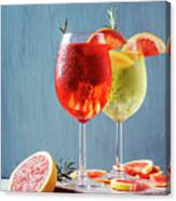 Red And White Aperol Spritz Garnish In Wine Glasses Canvas Print