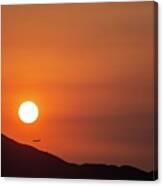 Red Sunset And Plane In Flight Canvas Print