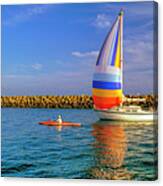 Sailboat And Kayak Going Home Canvas Print