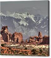 Sandstone Formations And Turret Arch Vista In Arches National Park With La Sal Mountains Behind Canvas Print