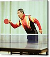 Senior man playing table tennis Canvas Print