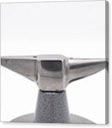 Small anvil in front of white background Photograph by Stefan