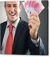 Smiling businessman with bank notes Canvas Print