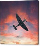 Spitfire Flying At Sunset Canvas Print