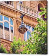Street Lamp On Aerial Wires And A Beautiful Old Building Canvas Print