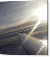 Sun Rays On A Plane Wing Kn45 Canvas Print