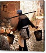 The Water Carrier Canvas Print