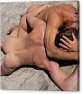 Two Nude Men In Homoerotic Kiss On The Sand At The Beach. Canvas Print