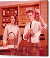 Two Students In Chemistry Laboratory, Conducting Experiment, Boy Holding Test-tube, Girl Making Notes. Canvas Print
