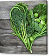 Vegetables - Green Heart Shape On Wood Background Canvas Print
