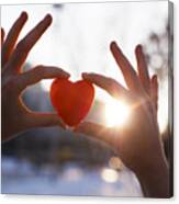 Woman Hands Holding Red Heart At Sunset Canvas Print