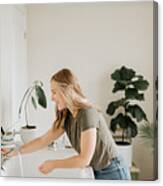 Woman Washing Hands In Sink Canvas Print