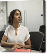 Young Woman Watching A Presentation In A Modern Office Canvas Print