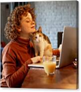 Young Woman With Cat Using Laptop Canvas Print