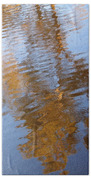 Gold And Blue Reflections Beach Towel by Michelle Wrighton
