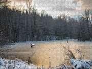 Winter landscape with frozen lake and warm evening twilight by Matthias  Hauser
