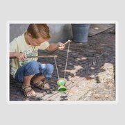 https://render.fineartamerica.com/images/rendered/small/flat/sticker/images-medium-5/boy-playing-with-a-diabolo-patricia-hofmeester.jpg?transparent=0&targetx=0&targety=135&imagewidth=1000&imageheight=730&modelwidth=1000&modelheight=1000&backgroundcolor=5D5756&orientation=0&producttype=sticker-3-3&imageid=13909296&brightness=266&stickerbackgroundcolor=transparent