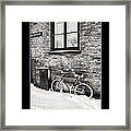 Bicycle Under A Window Framed Print