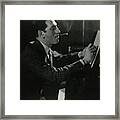 A Portrait Of George Gershwin At A Piano Framed Print