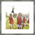 Girls Soccer Team Celebrating #1 Framed Print