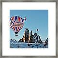 Hot Air Balloons Over Snow Covered Rock #1 Framed Print