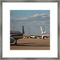 Passenger Airliners At An Airport #1 Framed Print