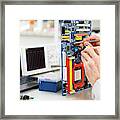 Person Repairing Electronic Circuit Board #1 Framed Print