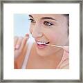 Woman Flossing Teeth #1 Framed Print