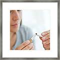 Young Woman Breaking Cigarette In Half #1 Framed Print