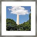 Obelisk Rises Into The Clouds Framed Print