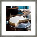 A Cheesecake Cut Into Slices On A Framed Print
