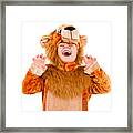 A Little Girl Dressed Up In A Lion Costume Framed Print