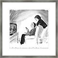 A Man And Wife Watch Television Framed Print