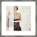 A Model Wearing A Bathing Suit By Cole Framed Print