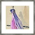 A Model Wearing A Blue Cape And Pink Chiffon Framed Print