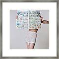 A Model Wearing A Girdle With A Comic Framed Print