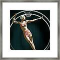 A Model Wearing A Swimsuit In An Exercise Ring Framed Print