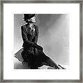 A Model Wearing Molyneux And A Hat By Descat Framed Print