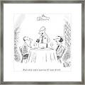 A Waiter Speaks To A Couple At A Restaurant Table Framed Print
