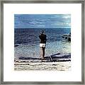 A Woman On A Beach Framed Print