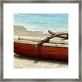Beached Canoe Framed Print