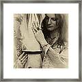 A Woman's Touch Framed Print