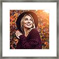 Beautiful Woman Enjoying In A Sunny Autumn Day Framed Print