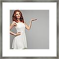 Beautiful Woman Presenting A Copyspace Framed Print