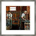 Blacksmith And Apprentice Framed Print