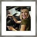 Blond Woman Choosing New Car In Car Dealership Framed Print