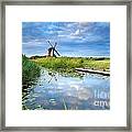 Blue Sky And Windmill Reflected In River Framed Print