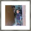 Boy In Doorway Framed Print