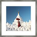 Buddhist Monk Walking Across Arches Of Framed Print