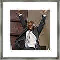 Businessman Sitting On Conference Table Cheering Framed Print